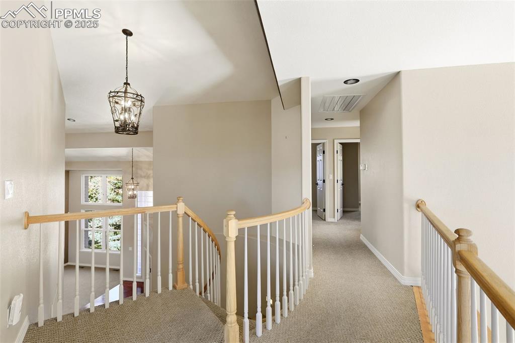 Image 28 of 50: Second Floor View from Spiral Staircase/Bridge!