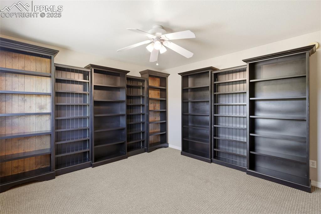 Image 31 of 50: 2nd of 3 Additional Bedrooms Another View of Custom Bookcases!