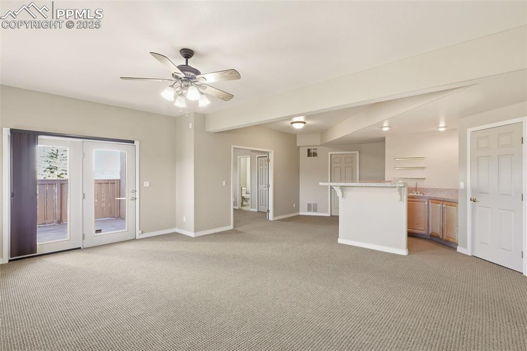 Image 32 of 50: Walk-out Basement with Wet Bar!