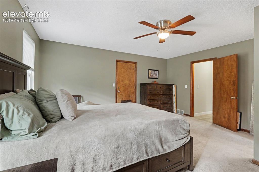 Image 15 of 39: Primary Bedroom Suite