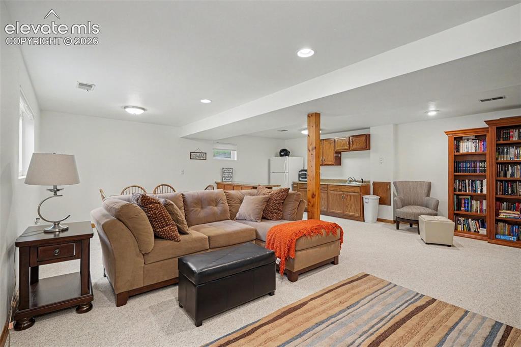 Image 21 of 39: Basement Family Room