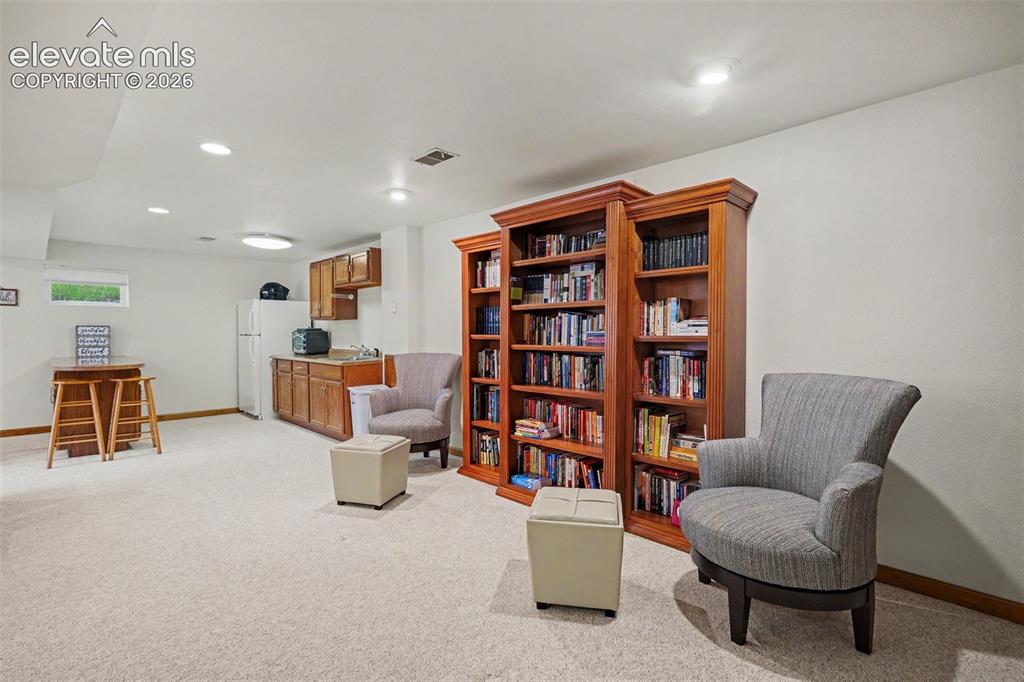 Image 22 of 39: Basement Family Room