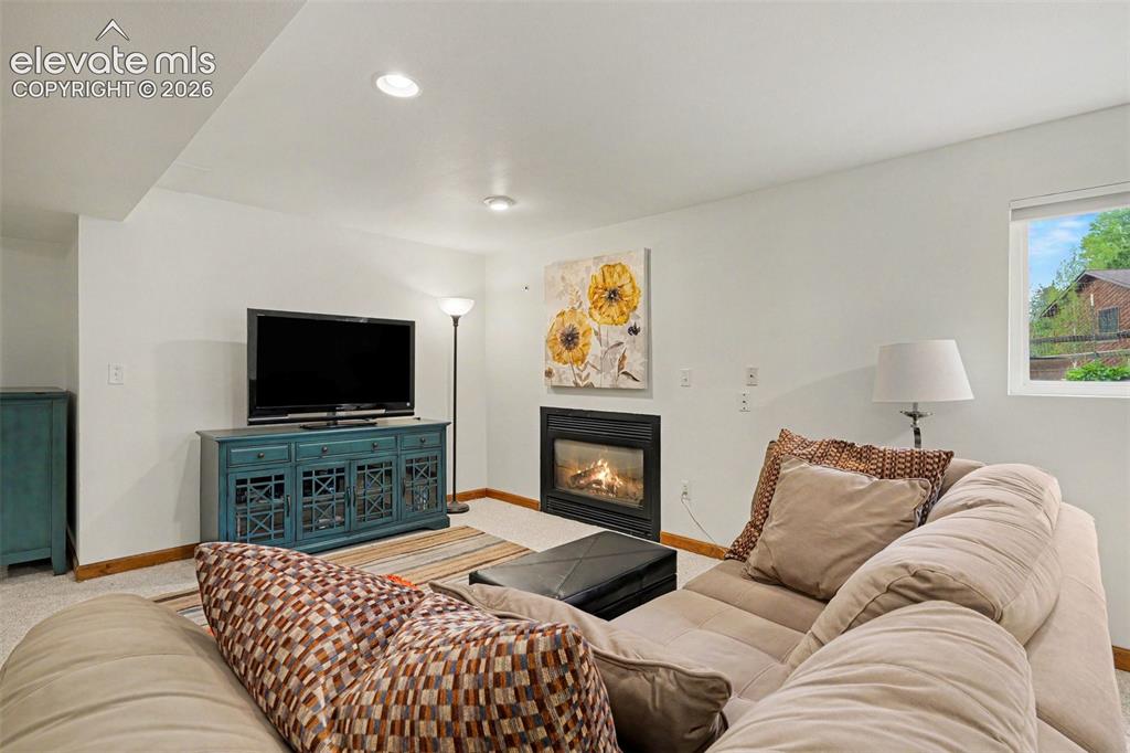 Image 23 of 39: Basement Family Room