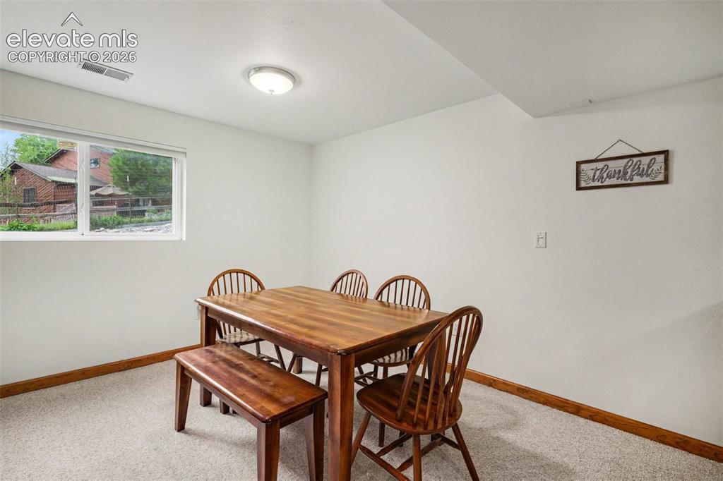 Image 24 of 39: Basement Family Room
