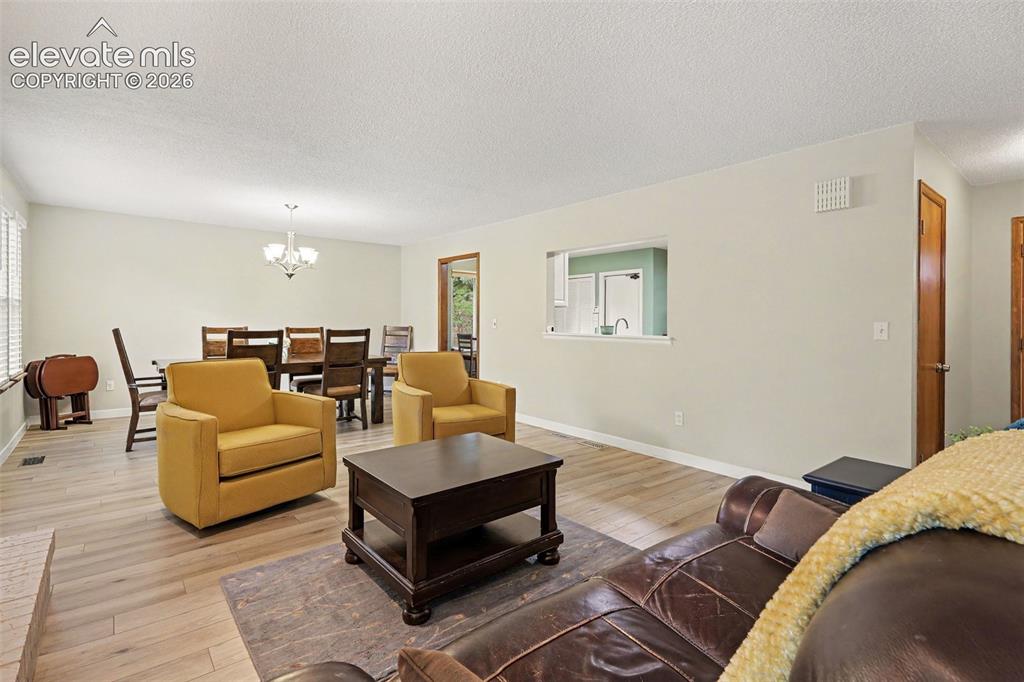 Image 6 of 39: Main Level Living Room