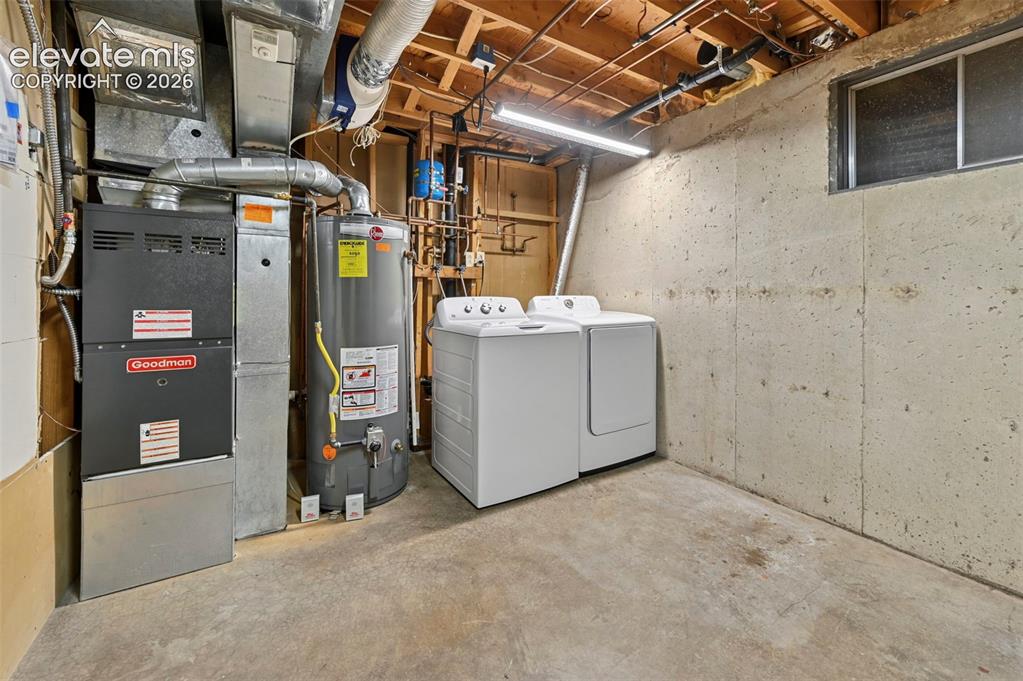 Image 46 of 50: Laundry room with lots of extra storage