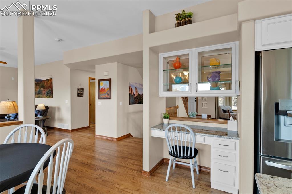 Image 14 of 50: This cute desk area would also make a perfect coffee or wine bar.