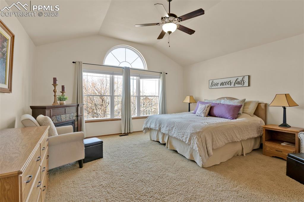Image 20 of 50: Light and Bright Primary bedroom with vaulted ceilings and a Pike