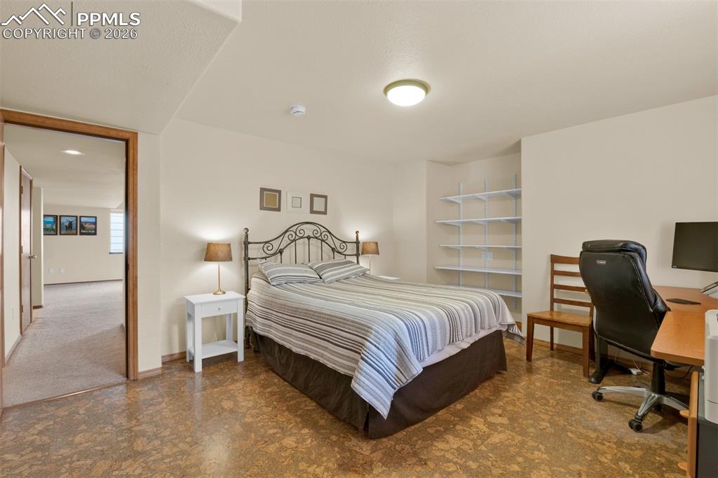 Image 36 of 50: Basement bedroom with large closet! Garden level window for great light and