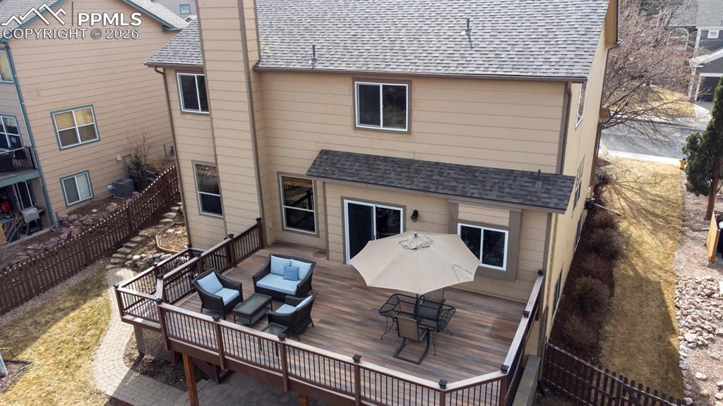 Image 38 of 50: Large expansive deck perfect for entertaining and taking in those views!