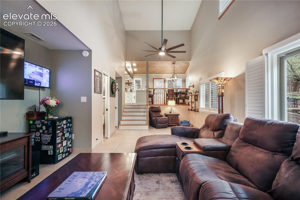 Image 21 of 50: Kitchen with updated appliances including double oven, beautiful wood beams