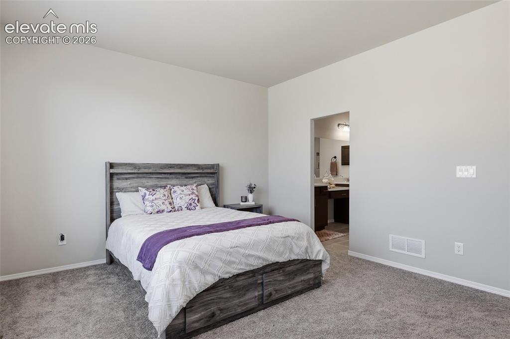 Image 23 of 43: Master Bedroom