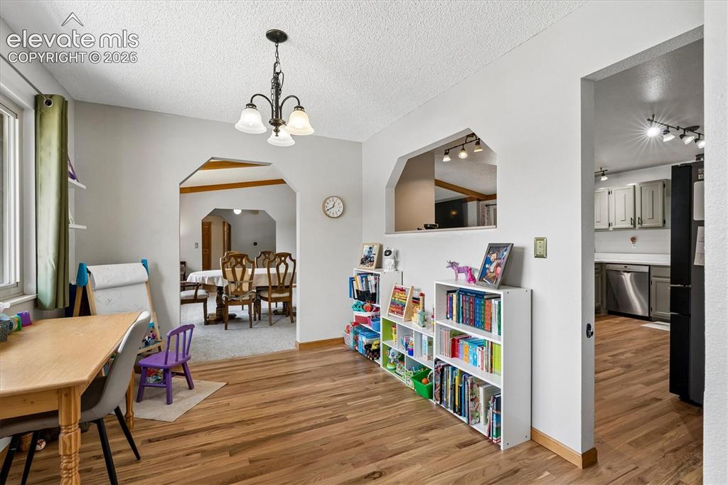 Image 10 of 30: breakfast nook or potential office with brand new hardwood floors