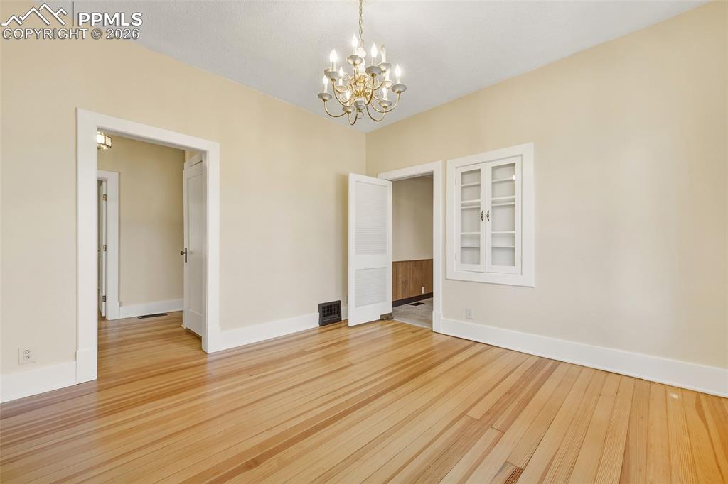 Image 15 of 47: Formal Dining Room With High Ceiling