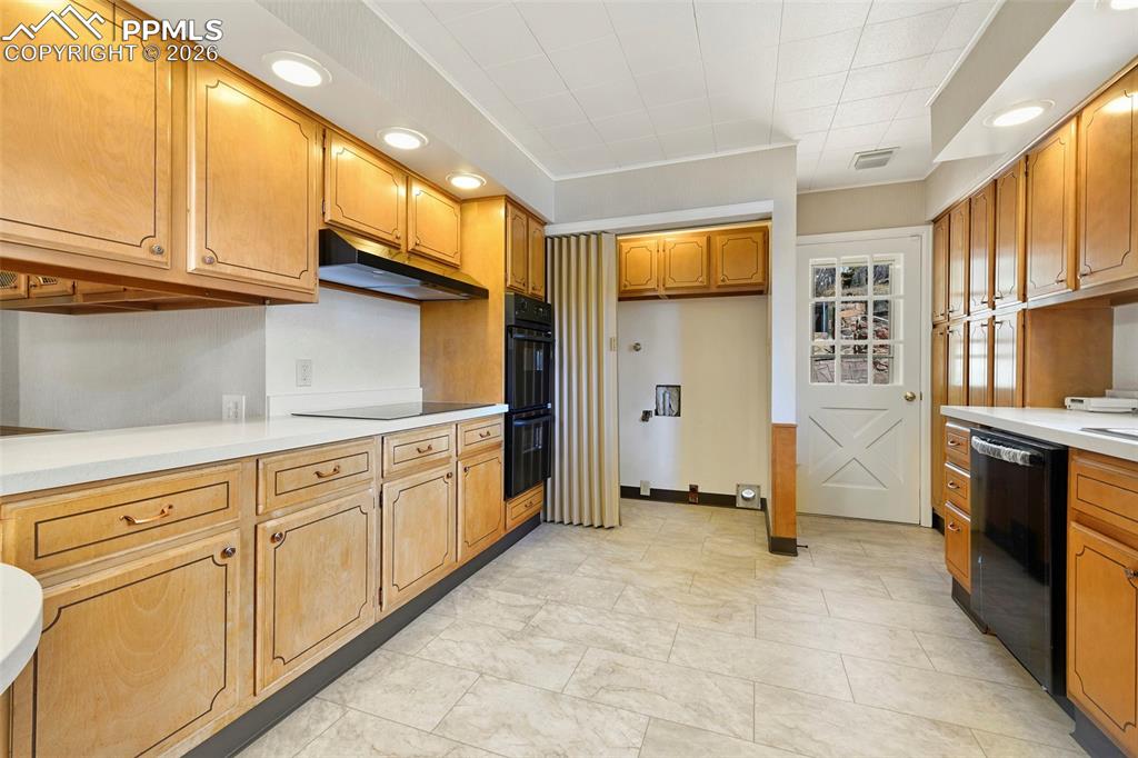 Image 18 of 47: Kitchen With View Of Laundry Closet