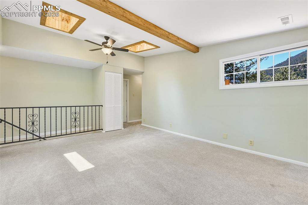 Image 28 of 47: Upper Level Family Room With Mountain Views