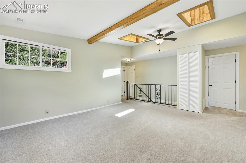 Image 30 of 47: Upper Level Family Room With Two Skylights