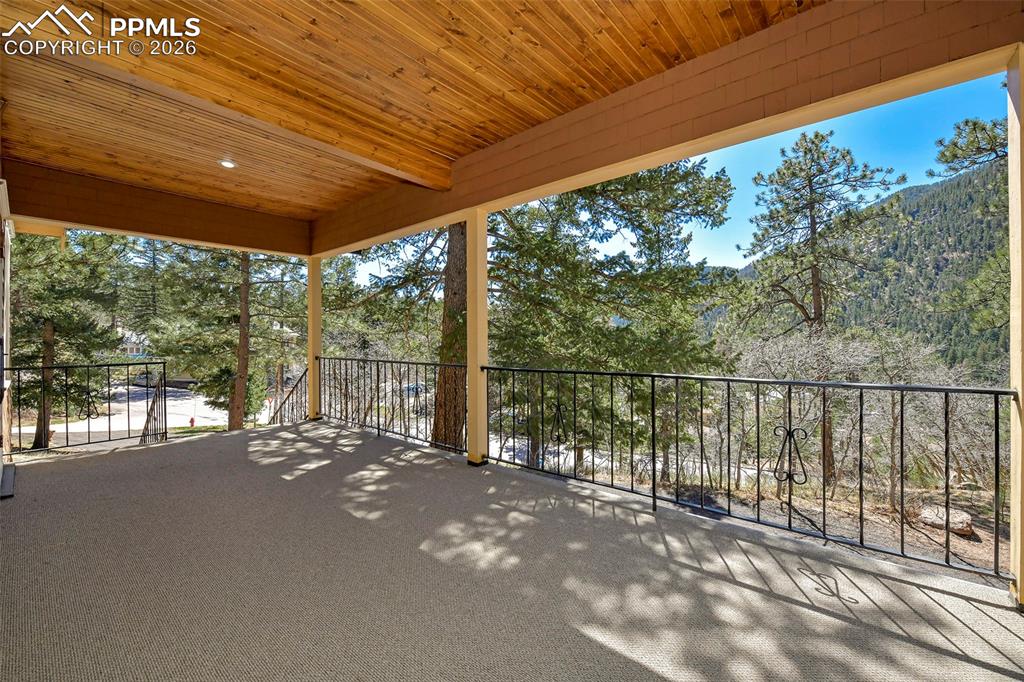 Image 7 of 47: Covered Deck/Porch With Mountain Views