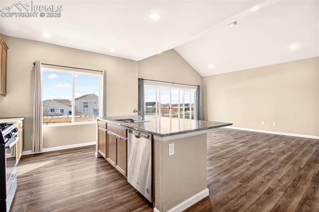 Image 13 of 41: Dishwaster and double basin sink in the island.