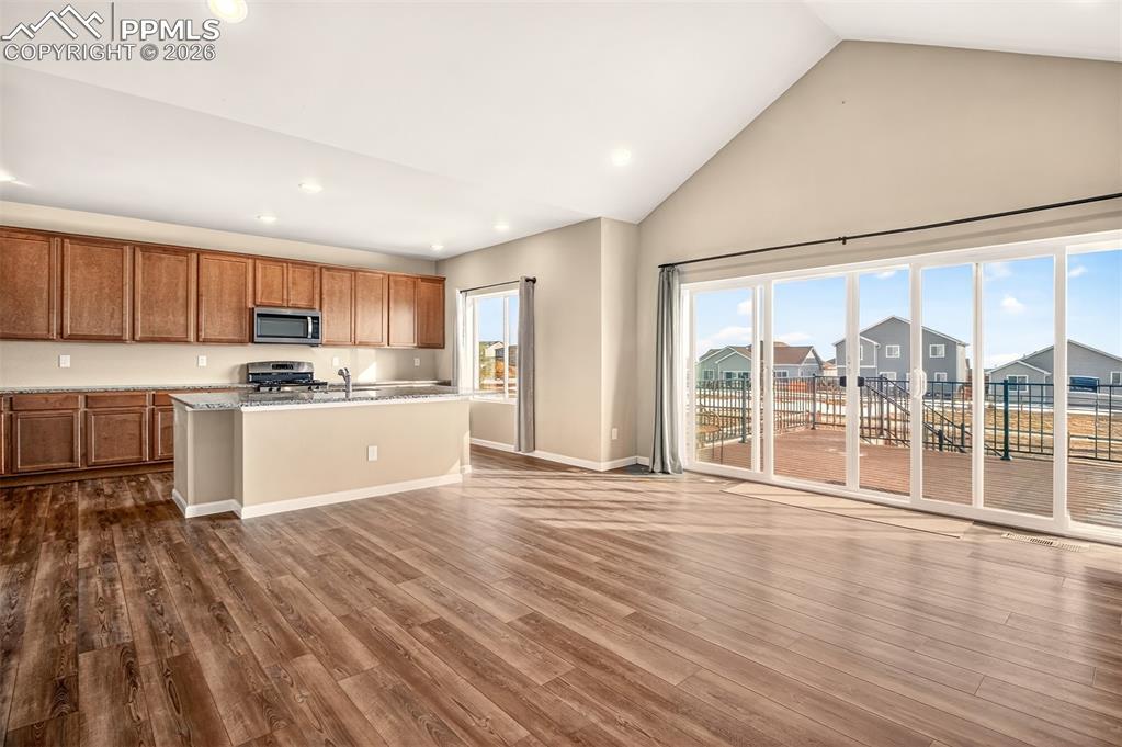 Image 14 of 41: A view from the living room looking towards the kitchen.