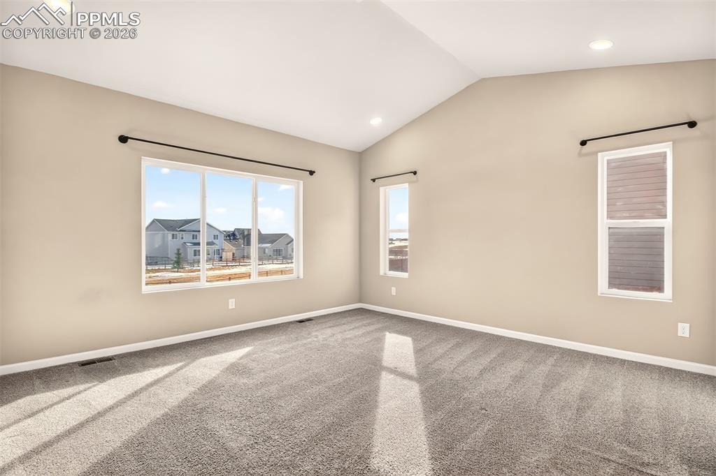 Image 17 of 41: Primary bedroom is located on the main level.