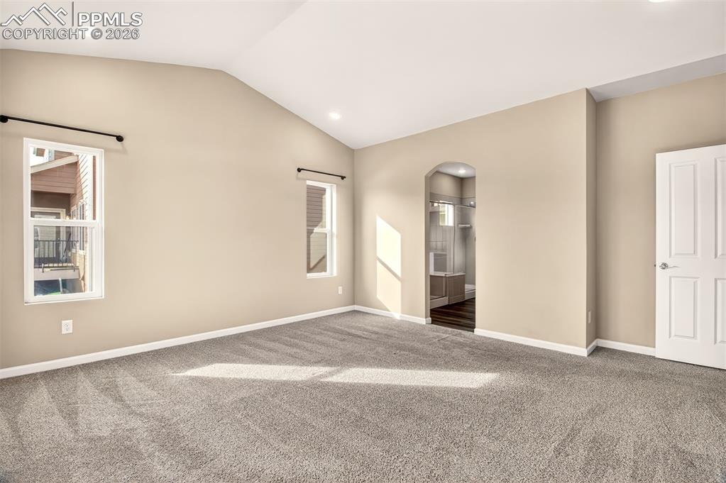 Image 18 of 41: Primary bedroom looking towards the en suite bathroom.