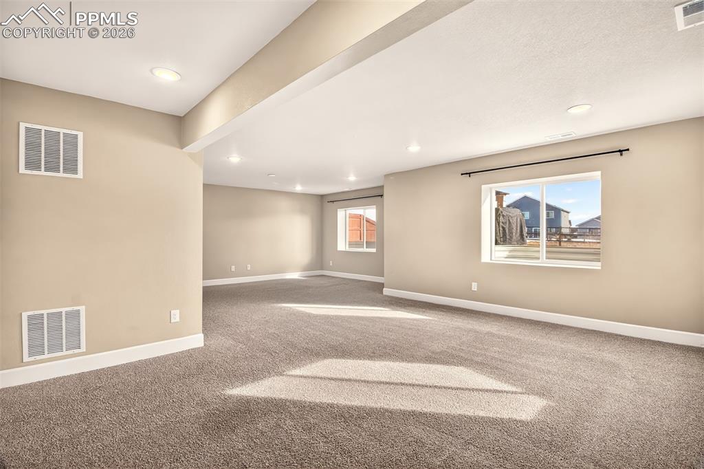 Image 26 of 41: Basement family room.