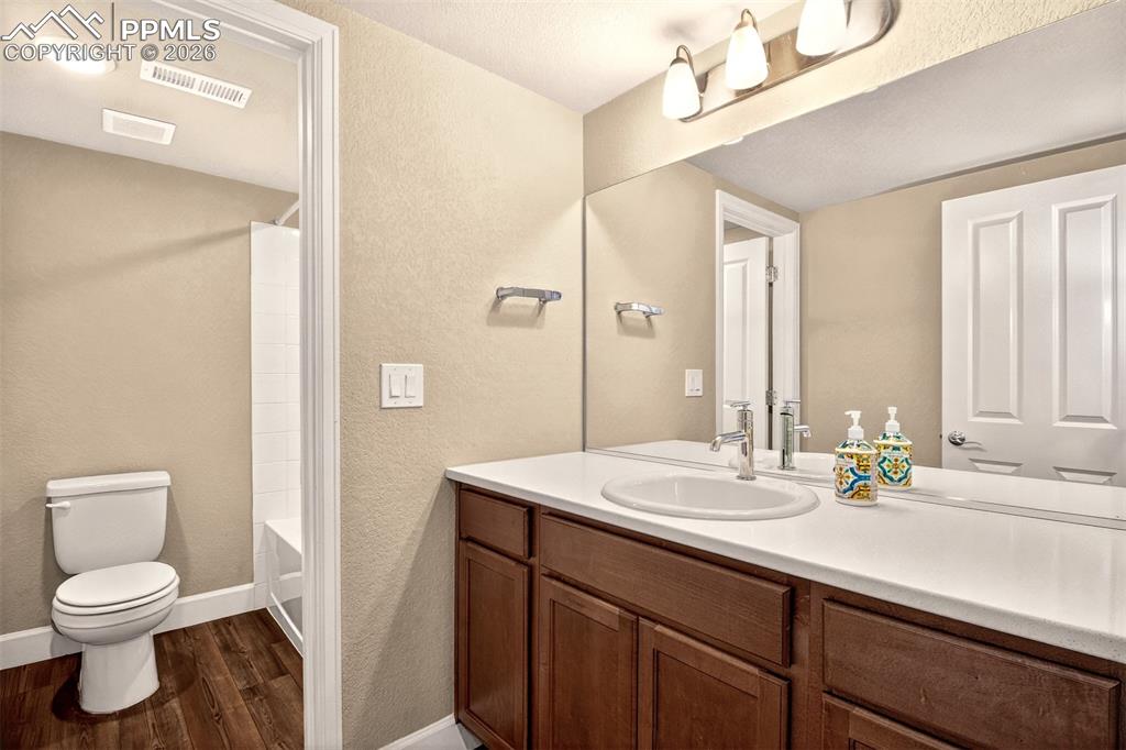 Image 32 of 41: Full bathroom located in the basement. 