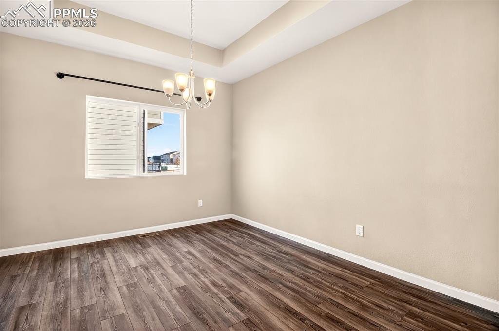 Image 8 of 41: Spacious dining room on main level.