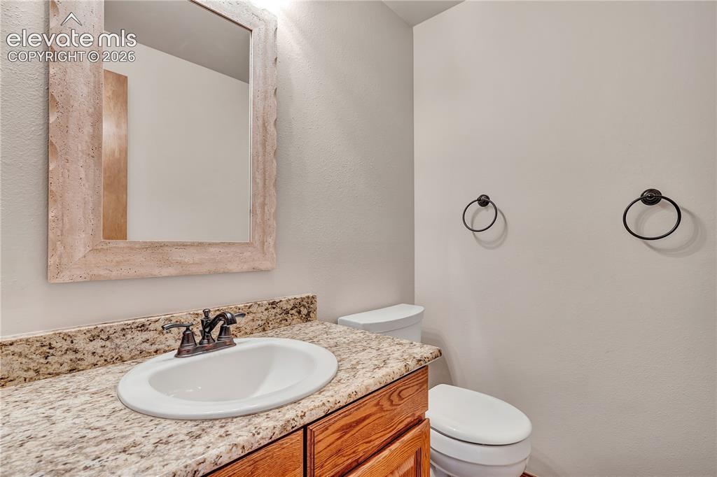 Image 15 of 46: 1/2 bath main level