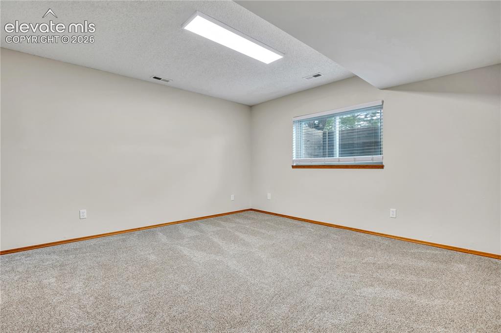 Image 36 of 46: basement bedroom 