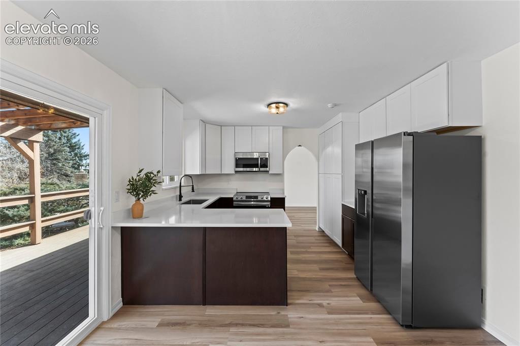 Image 13 of 49: Updated Kitchen