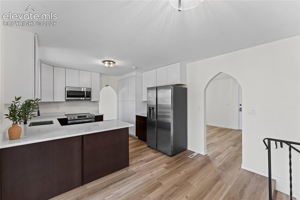 Image 15 of 49: Updated Kitchen