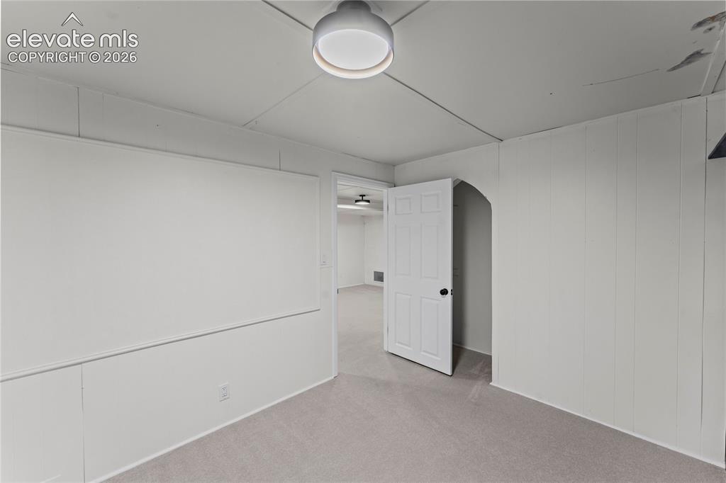 Image 36 of 49: Basement Bedroom 