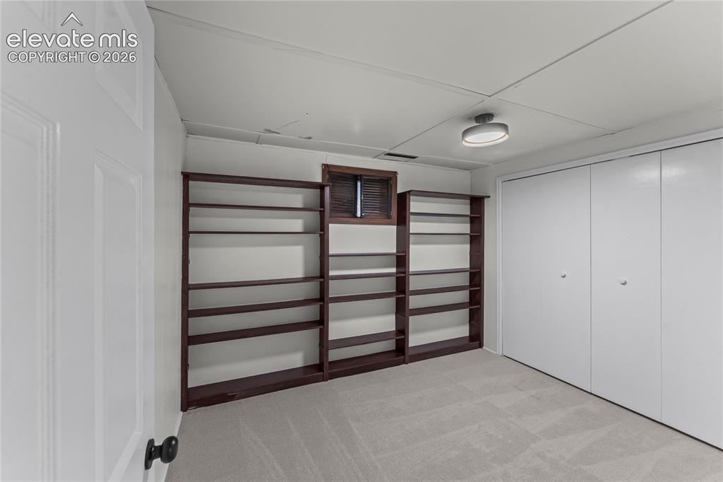 Image 37 of 49: Basement Bedroom 