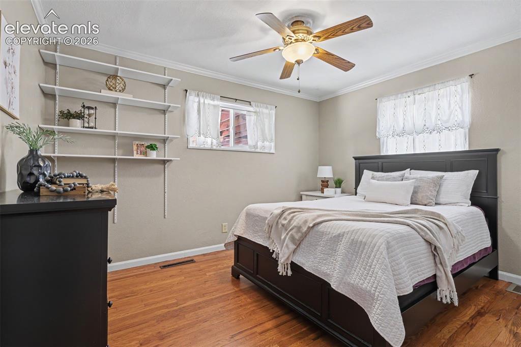 Image 22 of 36: 2nd bedroom with ceiling fan.