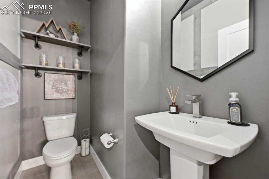 Image 33 of 50: Powder Room - Basement 