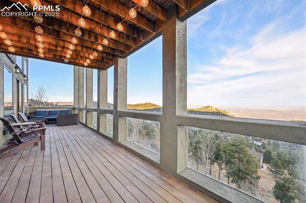 Image 17 of 50: Walk out to covered deck from the kitchen