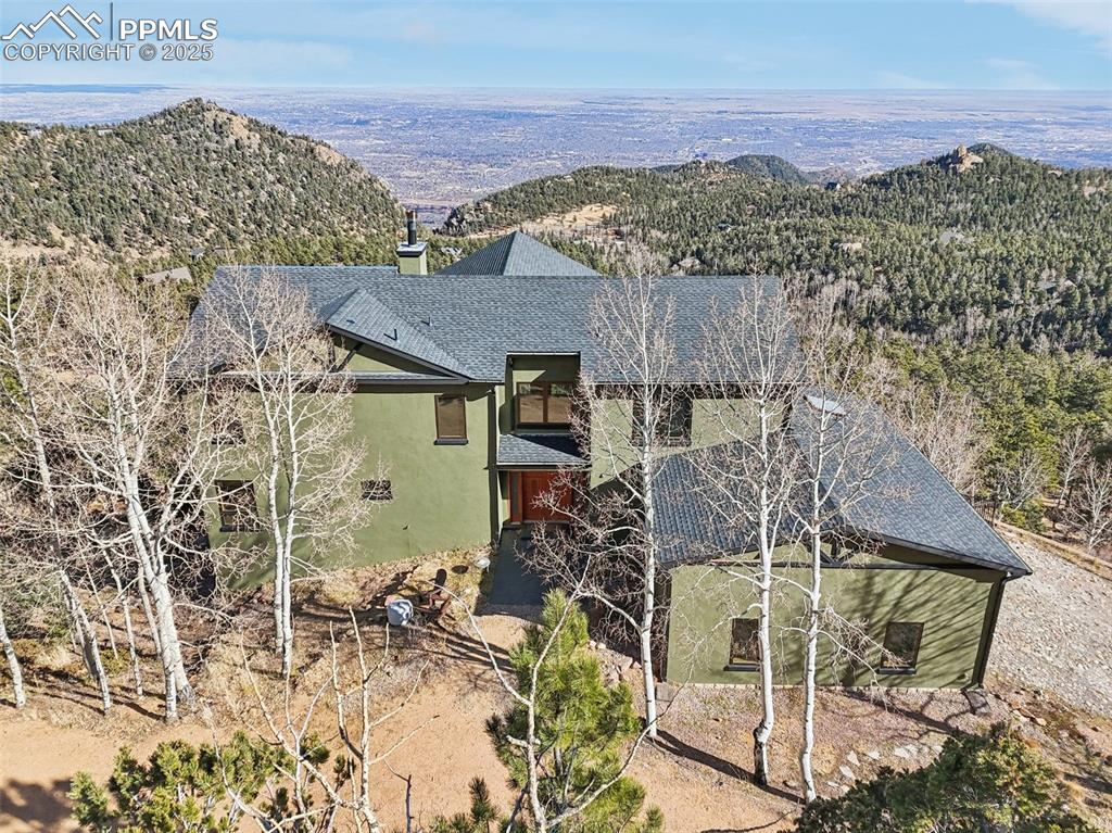 Image 2 of 50: Front of this spectacular mountain retreat with views that go on forever!