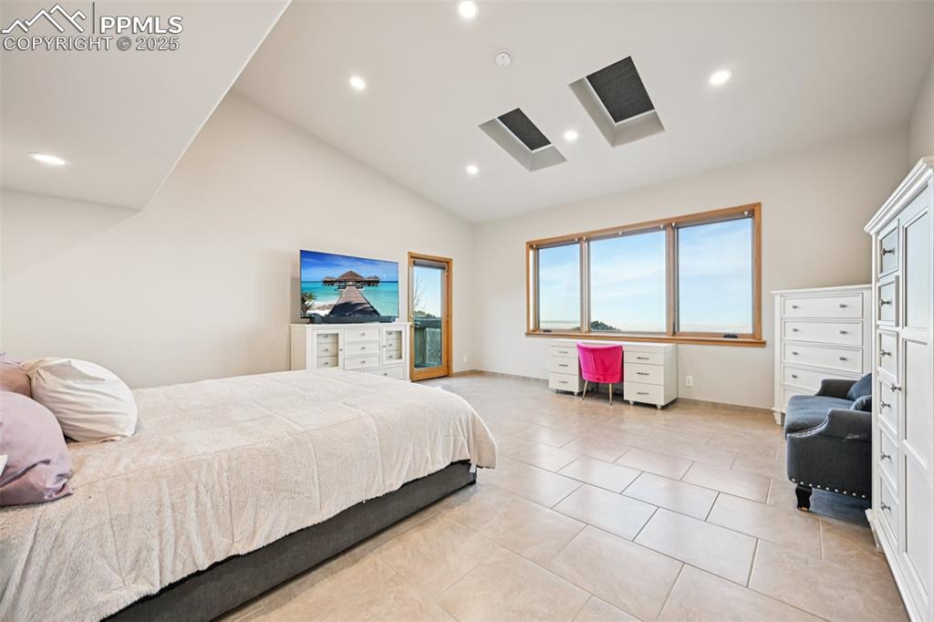 Image 21 of 50: Primary bedroom with its own private walk out, en suite 5 piece bathroom, s