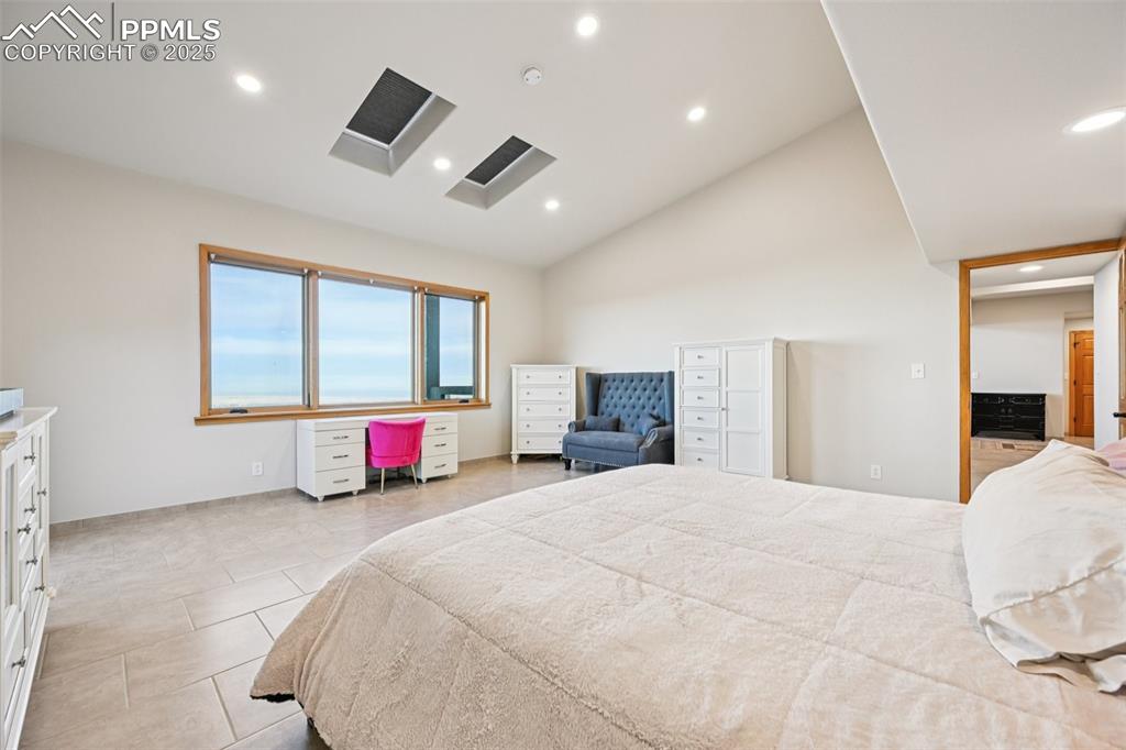 Image 23 of 50: Primary bedroom with its own private walk out, en suite 5 piece bathroom, s