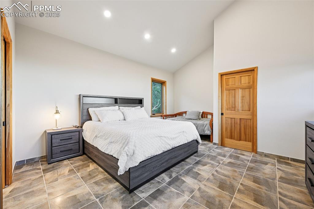 Image 28 of 50: Bedroom 2 with en suite 3/4 bathroom