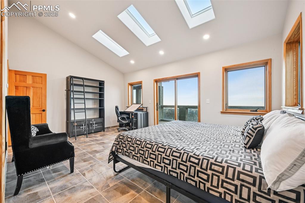 Image 34 of 50: Bedroom 4 with en suite 3/4 bathroom, sky lights, walk in closet and its ve