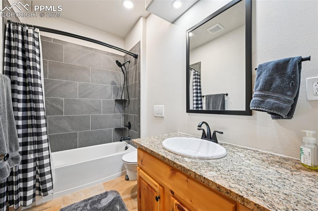 Image 45 of 50: Full bathroom on there lower level