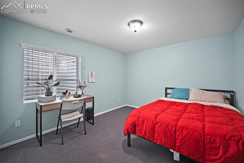 Image 32 of 50: Bedroom