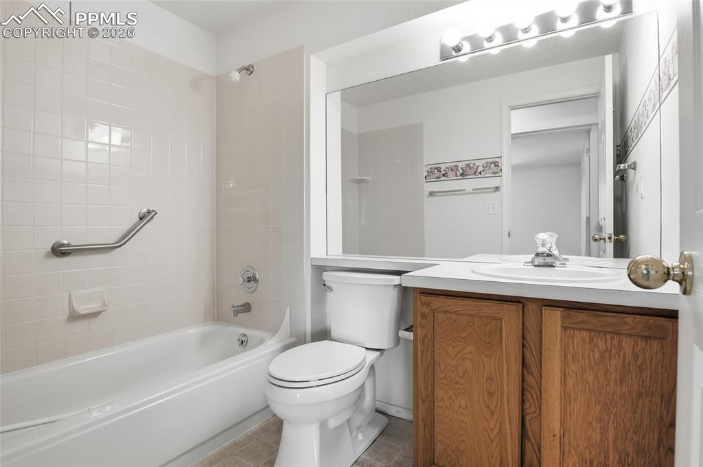 Image 44 of 50: Full bath with vanity and bathing tub / shower combination