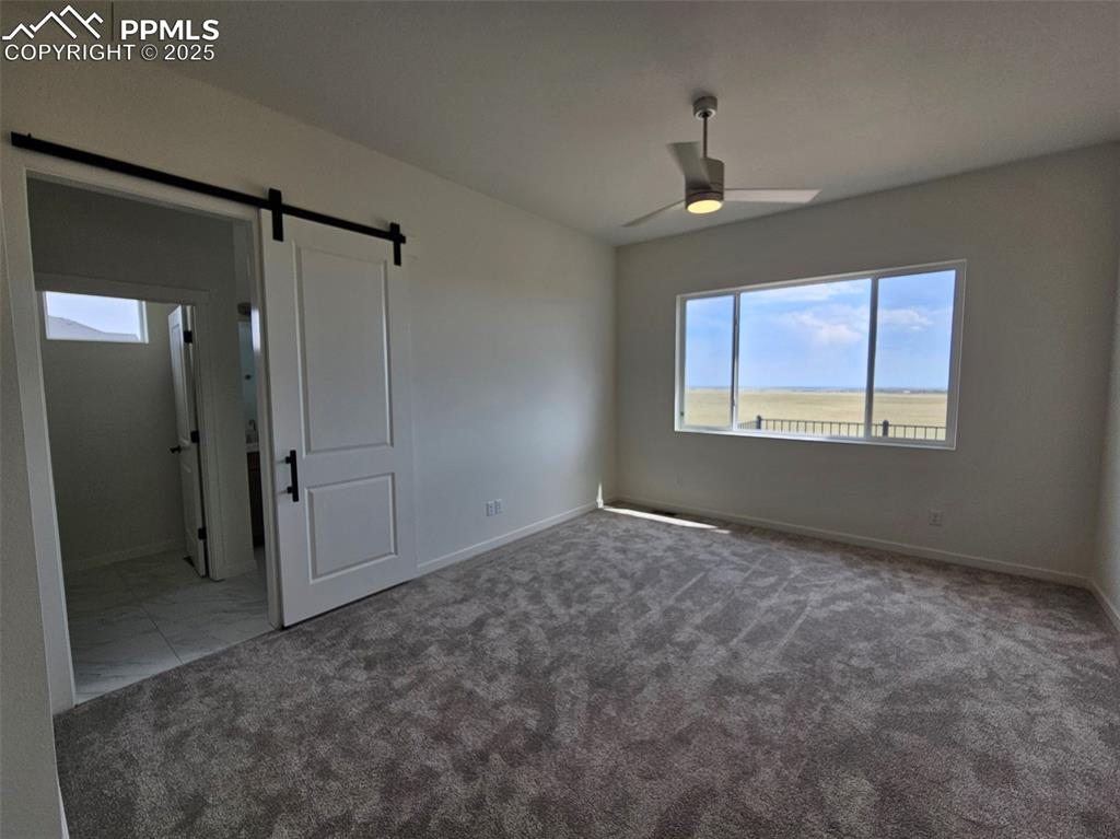 Image 13 of 21: Master Bedroom