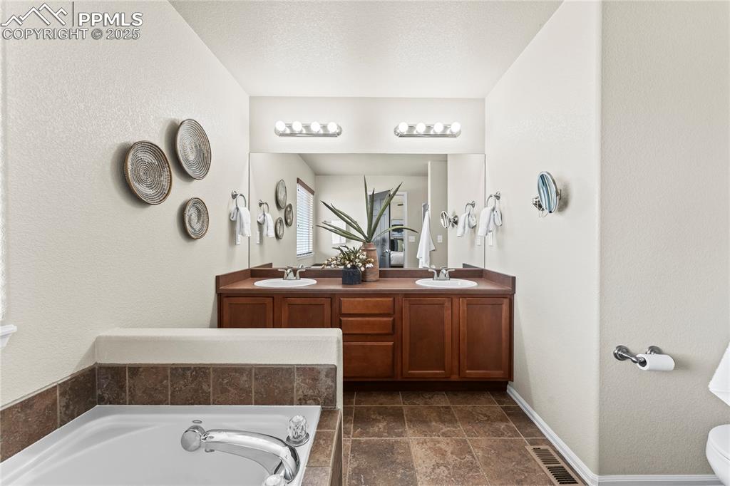 Image 25 of 48: Master Bathroom