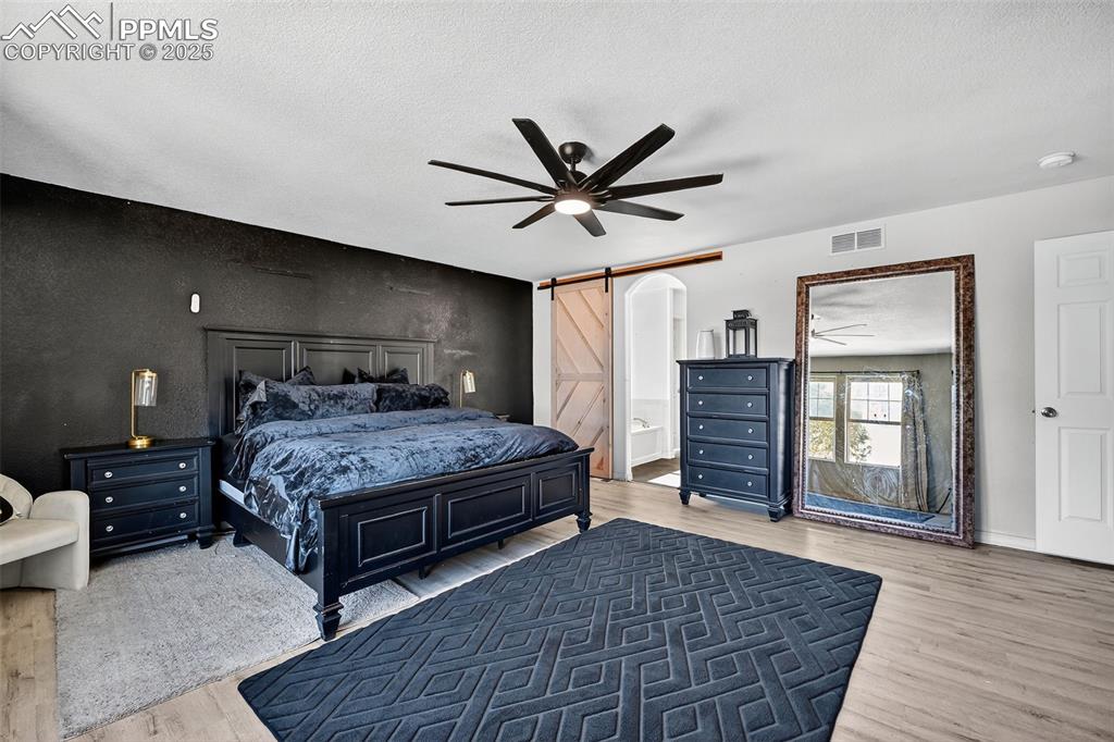 Image 23 of 34: Master Bedroom