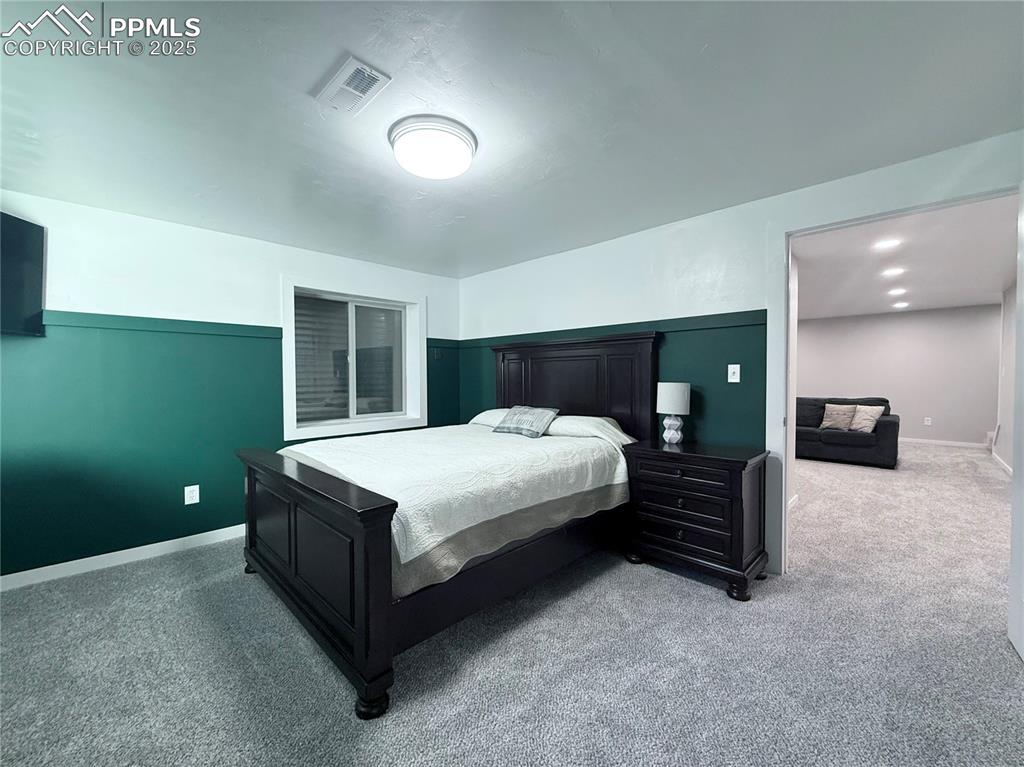 Image 21 of 38: Bedroom